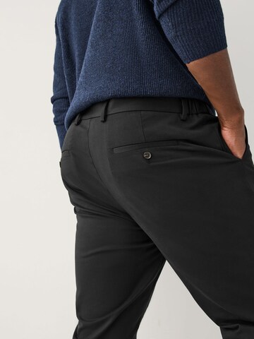 regular Pantaloni chino di Next in nero
