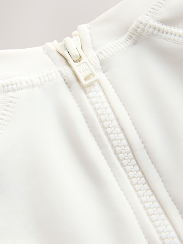 Next UV-skydd i beige