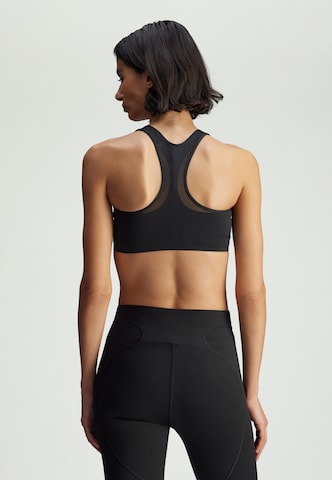 Bustier Soutien-gorge de sport 'Power Impact' ADIDAS BY STELLA MCCARTNEY en noir
