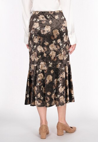 Usha Rok in Bruin