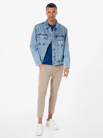 Calvin Klein Jeans Välikausitakki värissä sininen