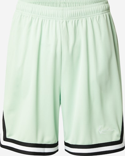 Kelnės iš Karl Kani, spalva – mėtų spalva / juoda / balta, Prekių apžvalga