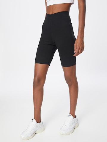 Gina Tricot Skinny Leggings in Black: front