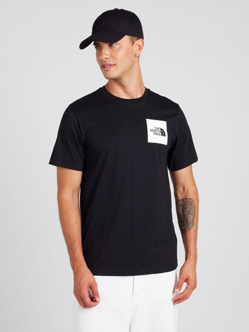 THE NORTH FACE T-shirt i svart: framsida