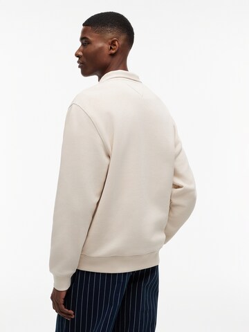 Bluză de molton de la Tommy Jeans pe bej