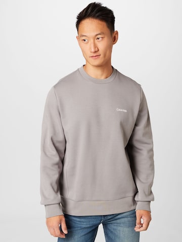 Sweat-shirt Calvin Klein en gris : devant