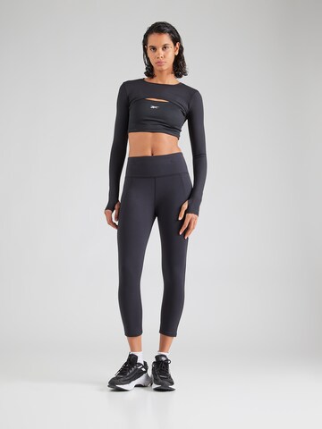 Skinny Pantaloni sportivi 'LUX' di Reebok in nero