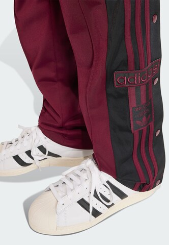 ADIDAS ORIGINALS Loosefit Kalhoty 'Adibreak' – červená