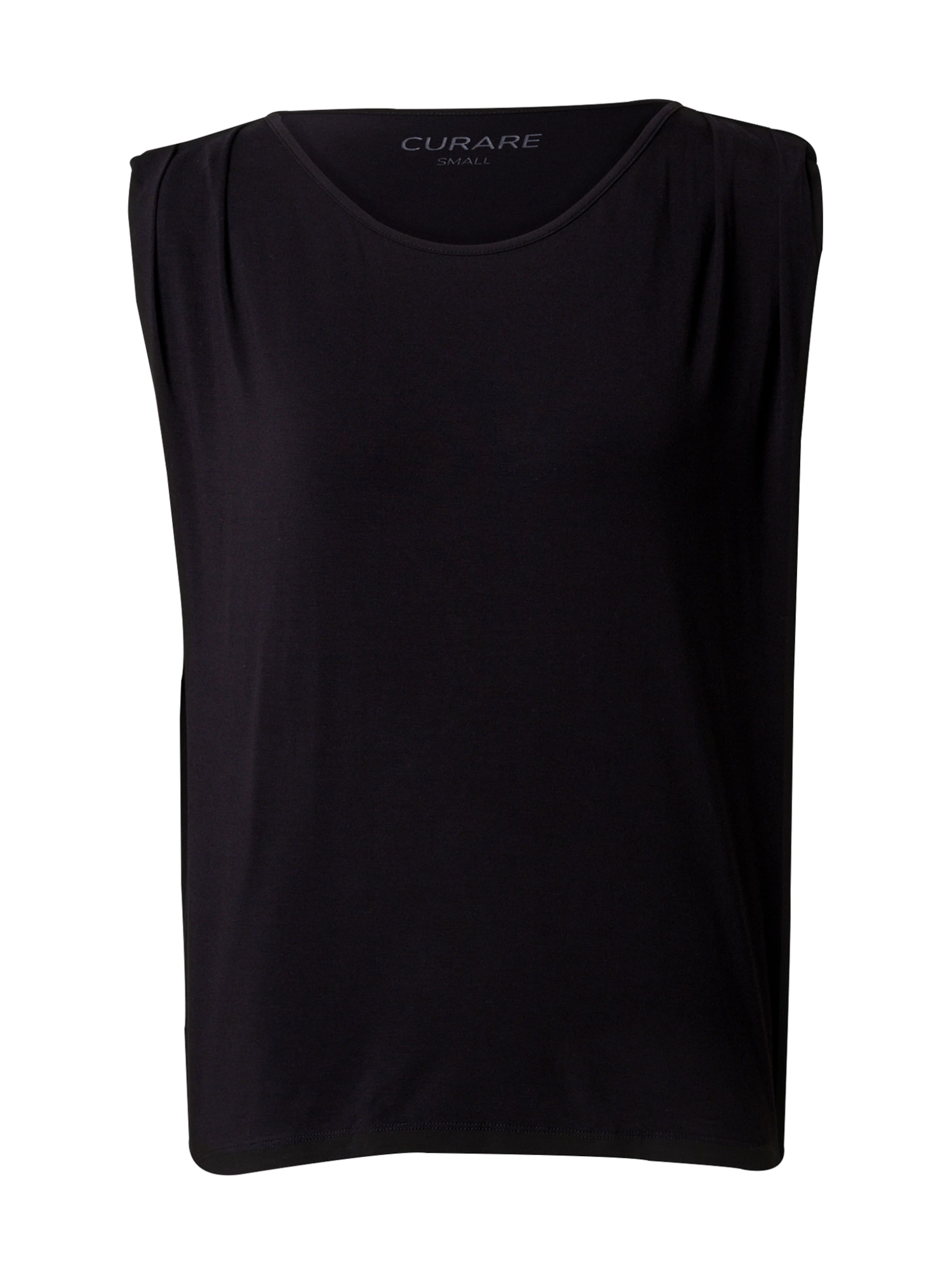 CURARE Yogawear Λειτουργικό μπλουζάκι σε μαύρο: μπροστά
