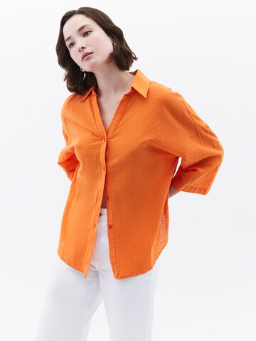 Camicia da donna di OXXO in arancione: frontale
