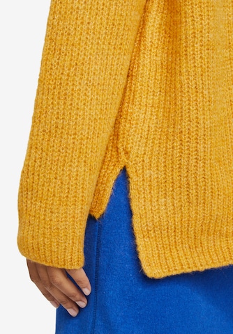 Pullover di Cartoon in giallo