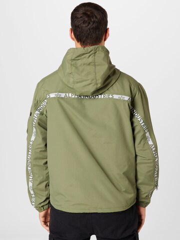 ALPHA INDUSTRIES Övergångsjacka 'Expedition' i grön