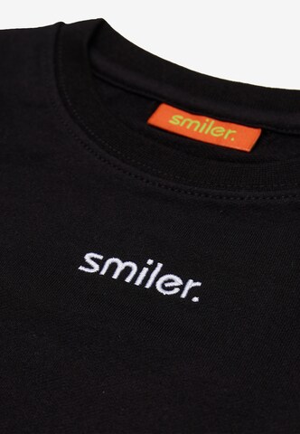 T-Shirt smiler. en noir