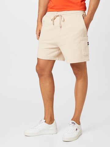 Regular Pantalon cargo Tommy Jeans en beige : devant