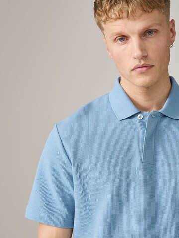 Tricou de la Next pe albastru