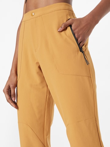 PUMA Regular Workout Pants in Beige