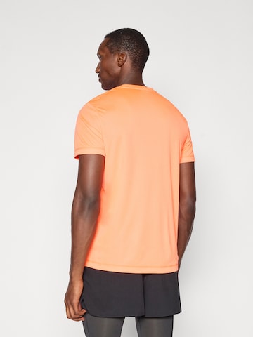 Reebok Funkční tričko 'ID TRAIN' – oranžová