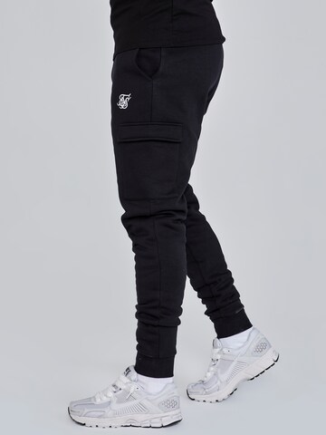 Effilé Pantalon cargo SikSilk en noir