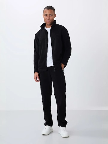 Tommy Life Joggingpak in Zwart: voorkant