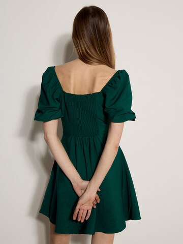 Apricot Fit And Flare Smocked Mini Dress ' ' in Grün