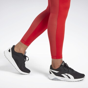 Skinny Pantalon de sport 'Lux Perform' Reebok en rouge