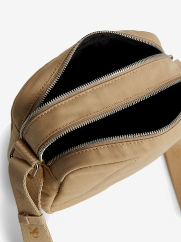 Calvin Klein Jeans Taška přes rameno – béžová