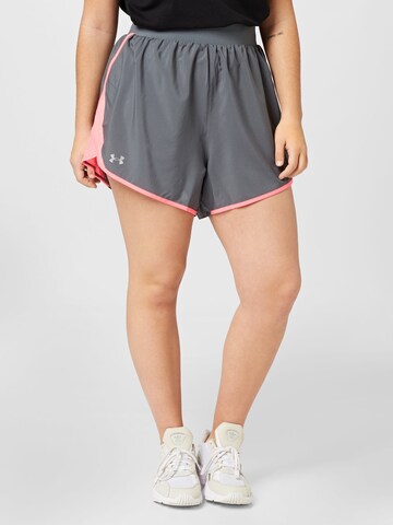 Regular Pantalon de sport UNDER ARMOUR en gris : devant