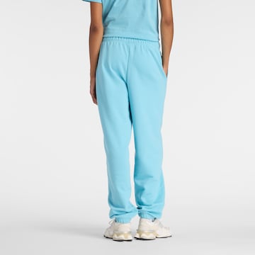 new balance Tapered Sports trousers in Blue