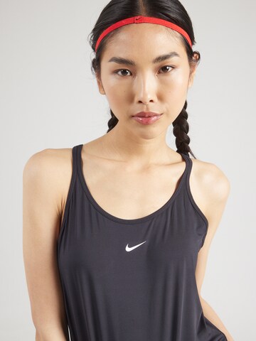 Top sportivo 'ONE' di NIKE in nero