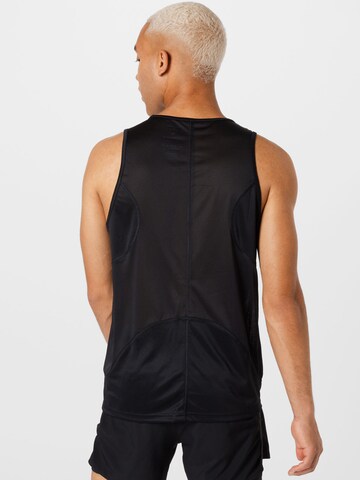 T-Shirt fonctionnel Reebok en noir