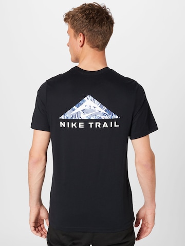 T-Shirt fonctionnel NIKE en noir : devant