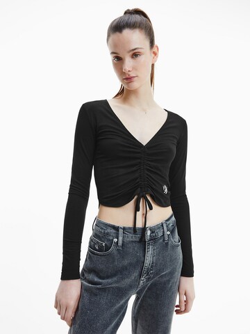 Tricou de la Calvin Klein Jeans pe negru: față