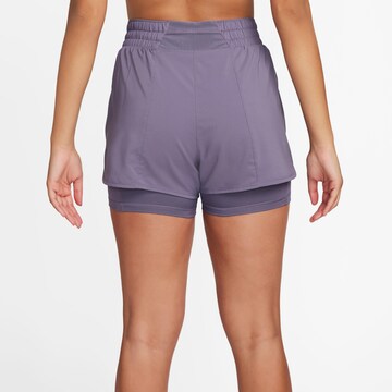 NIKE Regular Athletic Pants in Purple