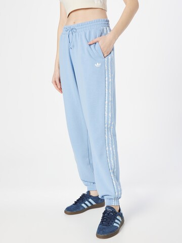 Tapered Pantaloni 'Abstract Animal Print' di ADIDAS ORIGINALS in blu: frontale