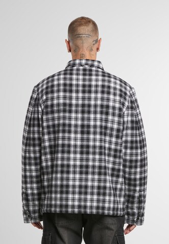 Coupe regular Veste mi-saison 'Sherpa' Brandit en blanc