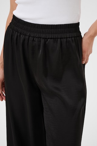 Kaffe - Pierna ancha Pantalón 'Thilde' en negro
