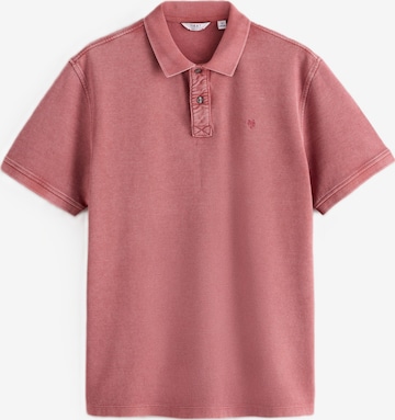 Next T-shirt i orange: framsida