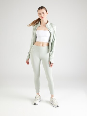 Skinny Pantaloni sportivi di Champion Authentic Athletic Apparel in verde