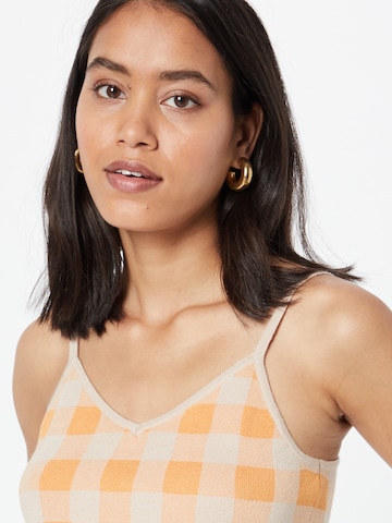 Aware Top 'UDELE' in Orange