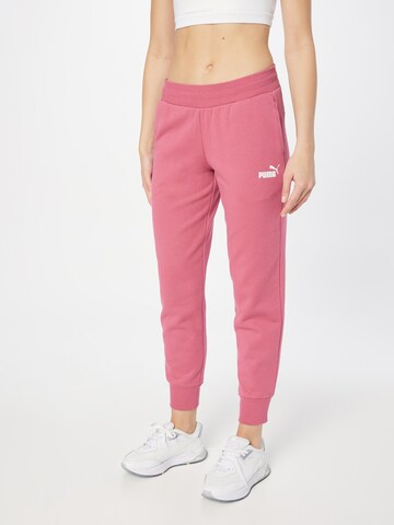 PUMA - Tapered Calças de desporto 'Essentials' em roxo: frente