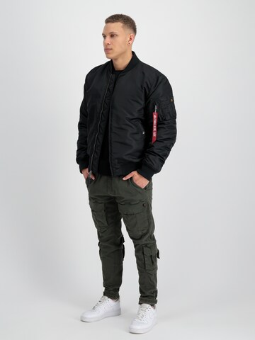 ALPHA INDUSTRIES Демисезонная куртка в Черный