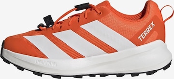 Chaussure de sport ADIDAS TERREX en orange : devant