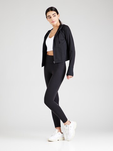 Skinny Pantaloni sportivi 'BOOST' di Fabletics in nero
