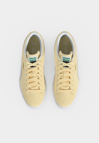 PUMA - Sapatilhas altas 'Classic' em amarelo