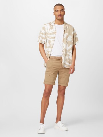 By Garment Makers Regular Shorts in Beige