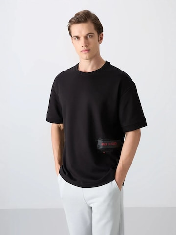 Tommy Life Koszulka w kolorze czarny: przód