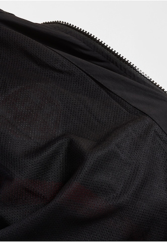 Tuta da jogging di Ecko Unlimited in nero