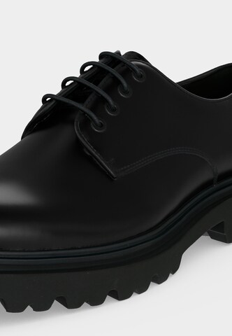 STEVE MADDEN Knytsko 'Motala' i svart