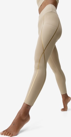 Leggings ' Gold ' Born Living Yoga en beige : devant