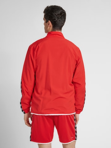 Veste de sport Hummel en rouge